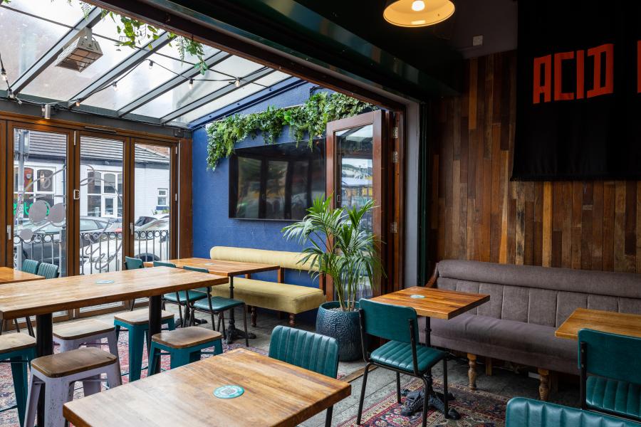 Private function room at All Bar One Manchester with cozy seating for hybrid events.