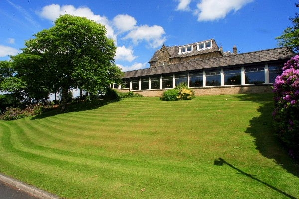 Grange Restaurant at Norton Grange Hotel: scenic venue for outdoor events with lush lawns.