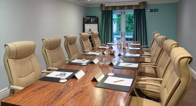 Private function room at Norton Grange Hotel with a spacious table for corporate meetings.