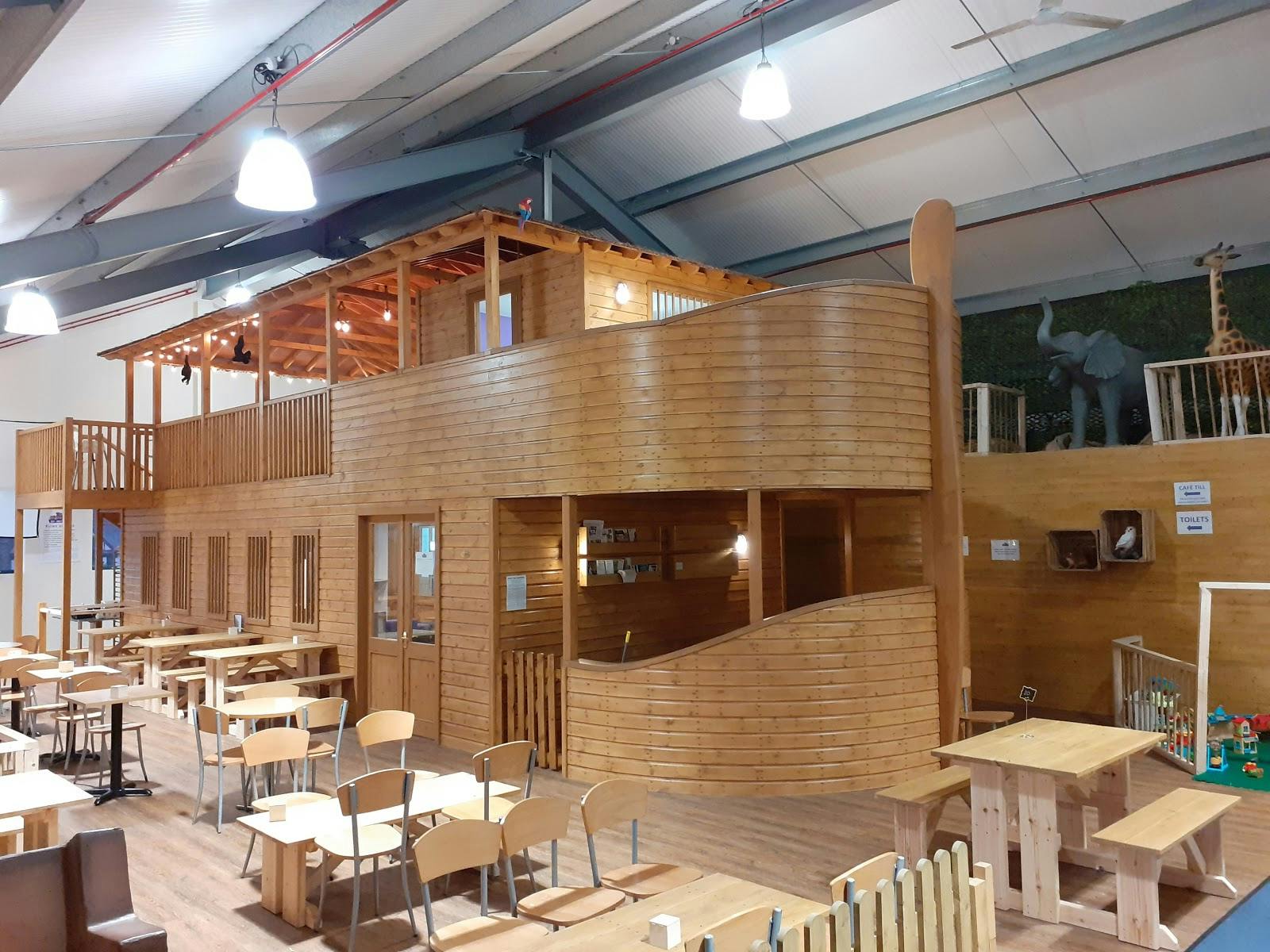 Multi-level wooden play area for creative meetings and team-building events.