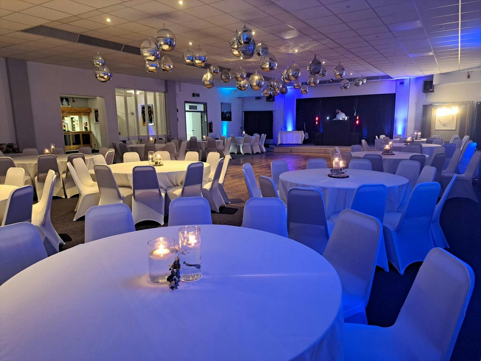 Stanley House event space with elegant tables for weddings and corporate gatherings.