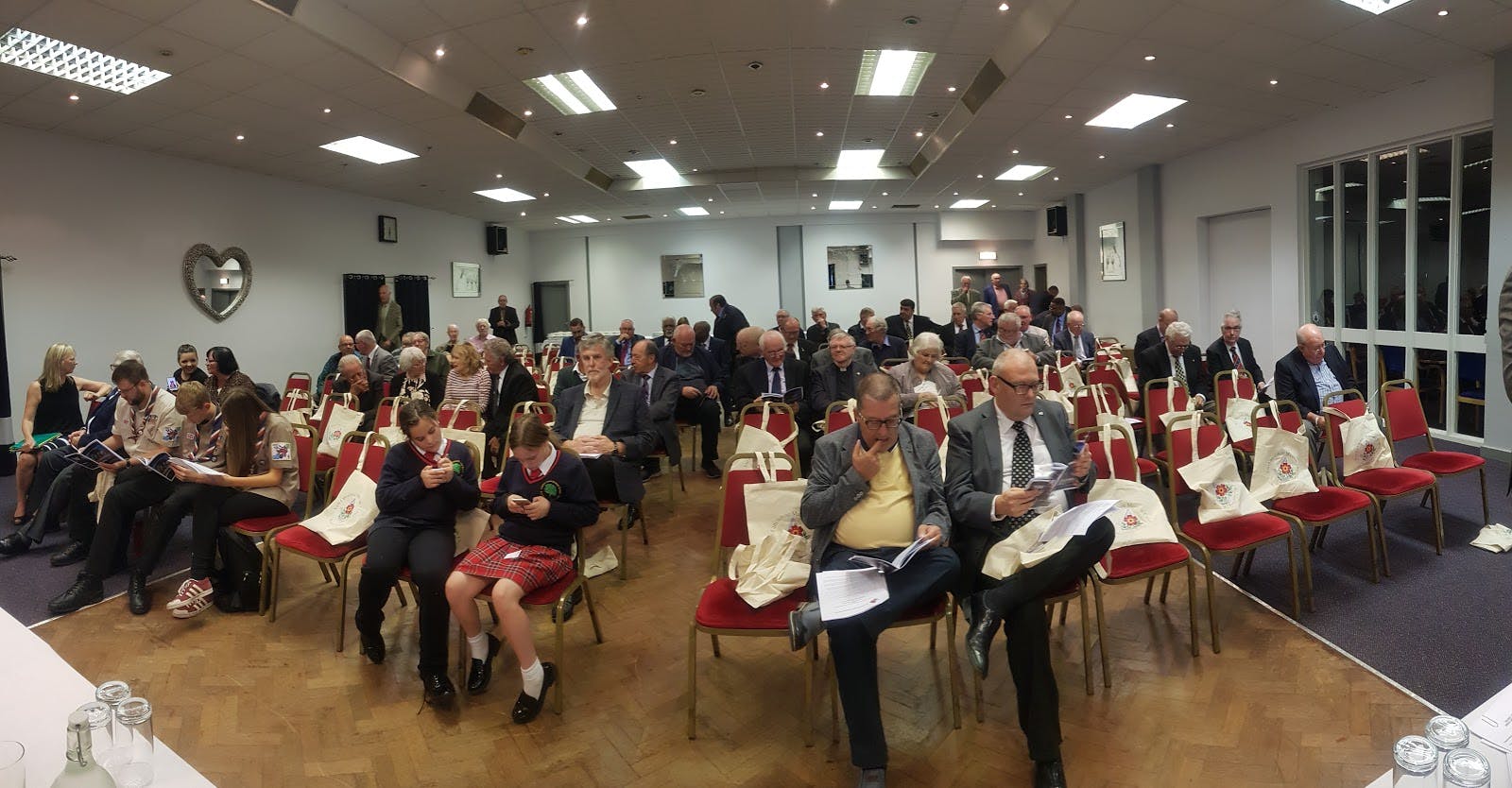 Engaged attendees in professional meeting setup at Stanley House Function Rooms.