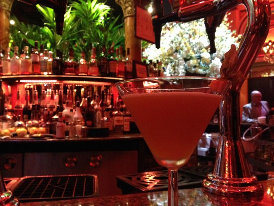 Cocktail bar in The Dome Edinburgh with lush greenery, ideal for networking events.