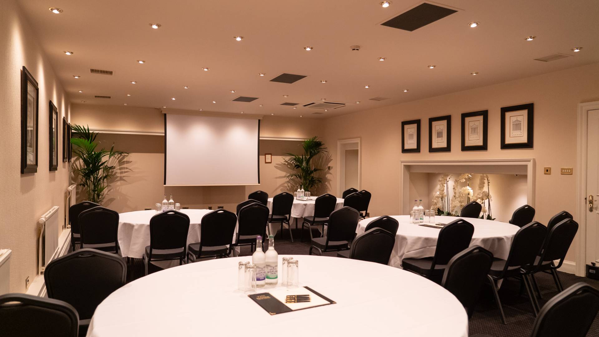Conference center in The Dome Edinburgh, featuring round tables for professional events.