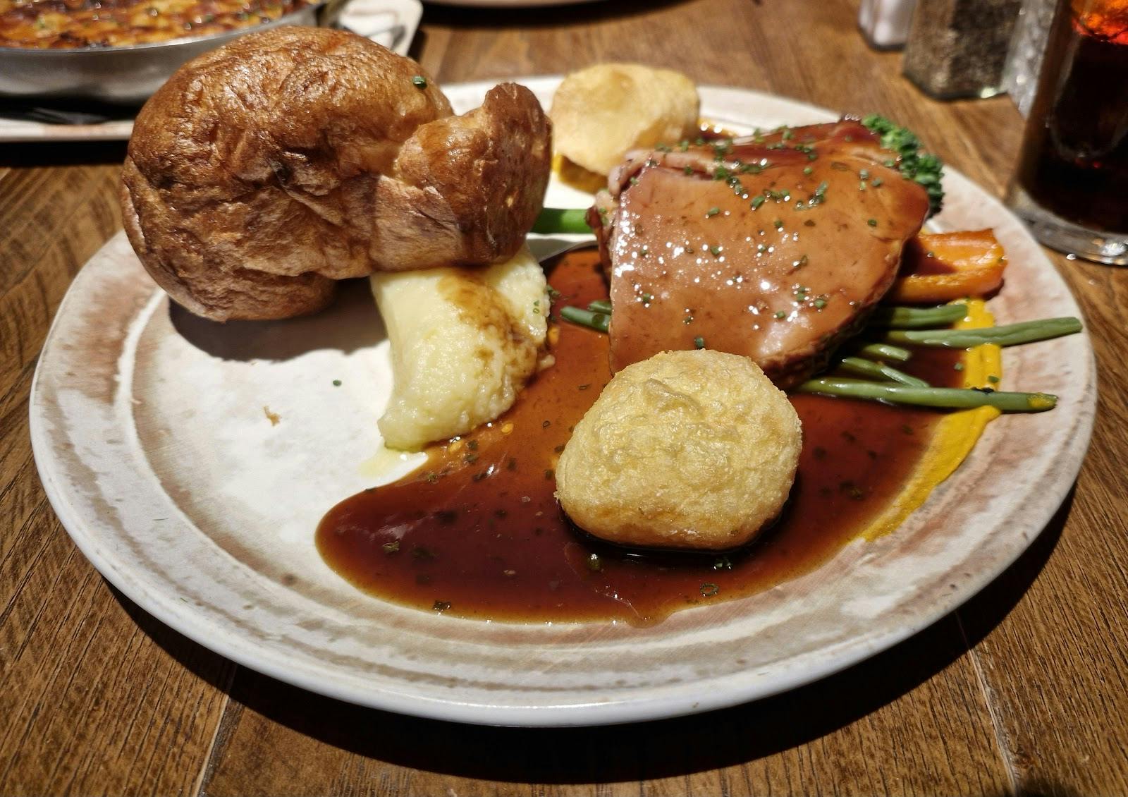Roast meal on a plate at Coral Room, perfect for events and catering.