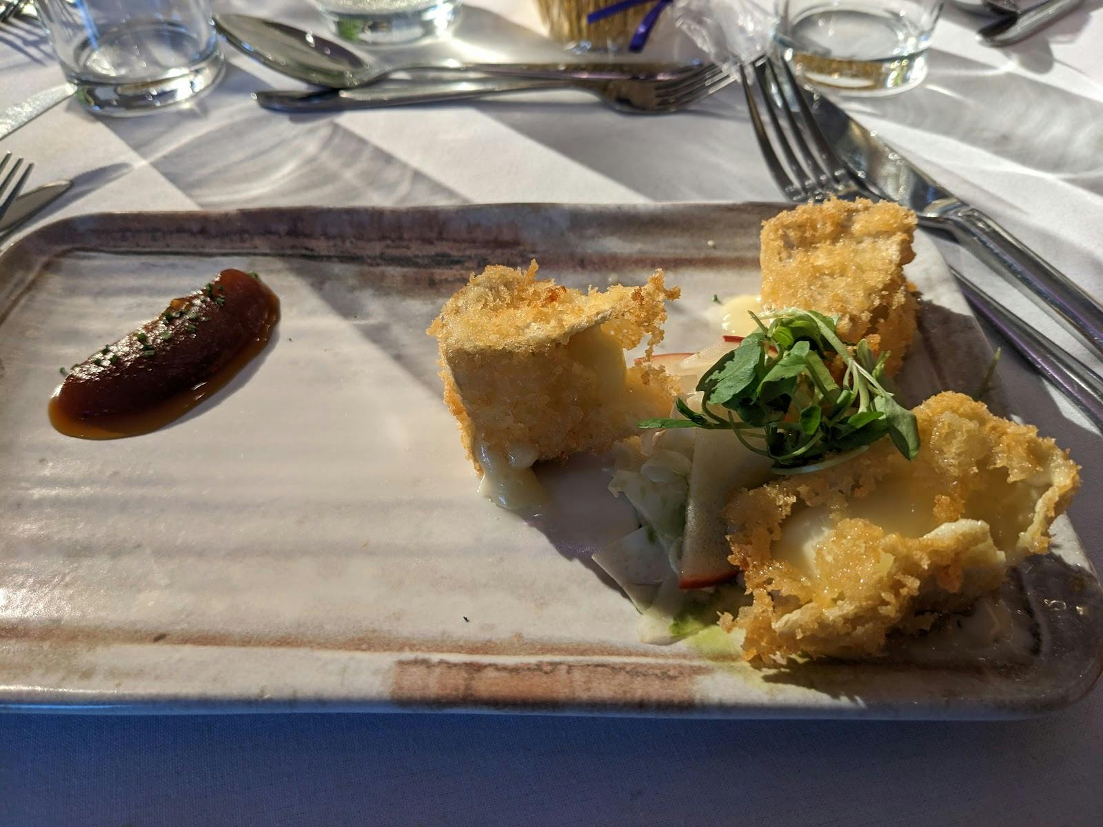 Elegant dish presentation at The Wayfarer's Coral Room for corporate dining events.