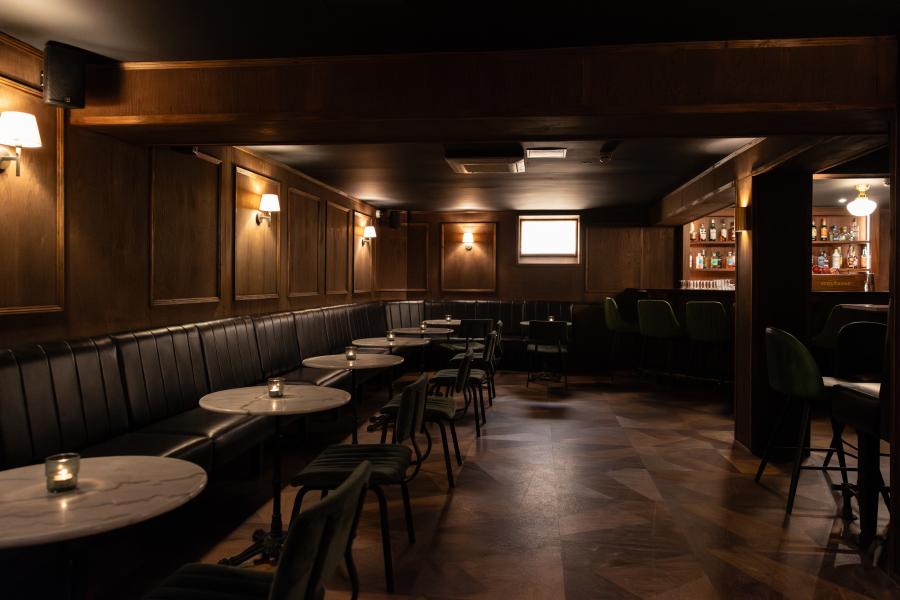 Sophisticated bar area in The Wayfarer, perfect for intimate networking events.