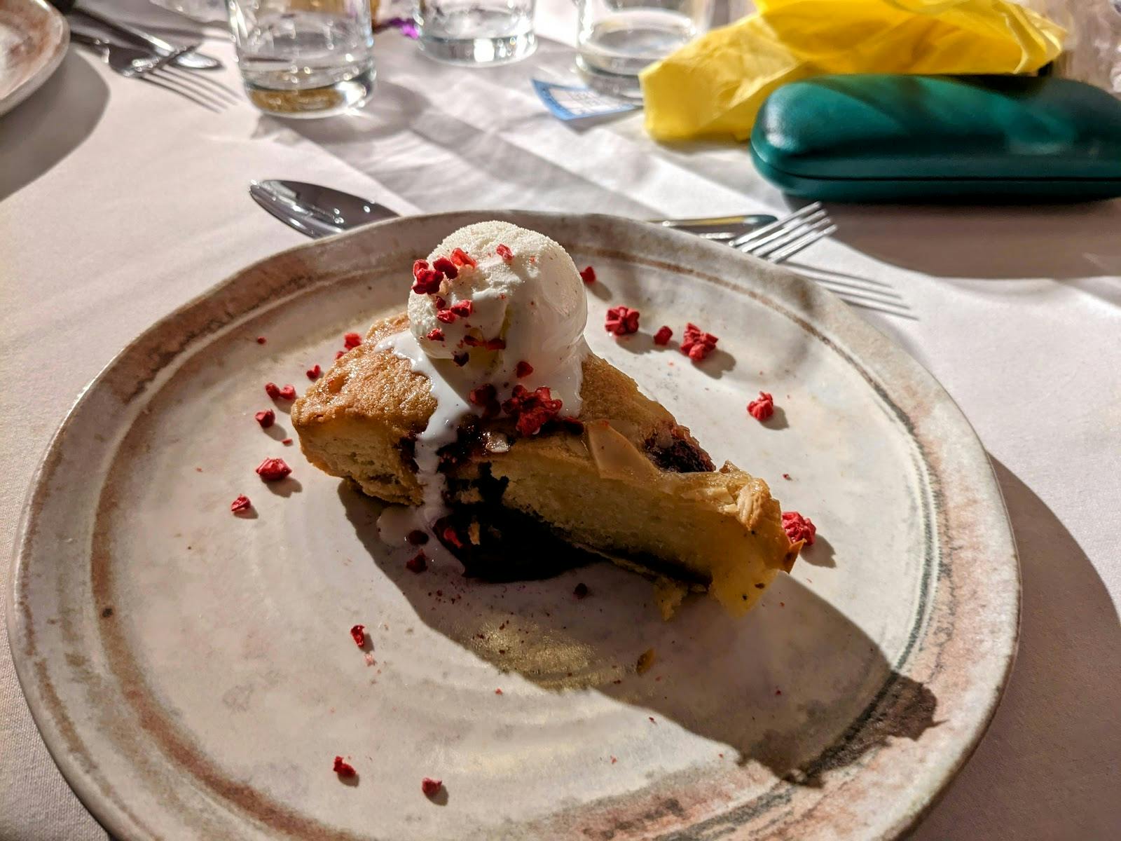 Elegant dessert cake with ice cream, perfect for events and meetings at The Wayfarer.