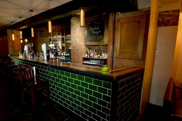 Arcane Cocktail Bar Manchester with rustic charm, ideal for networking events and gatherings.