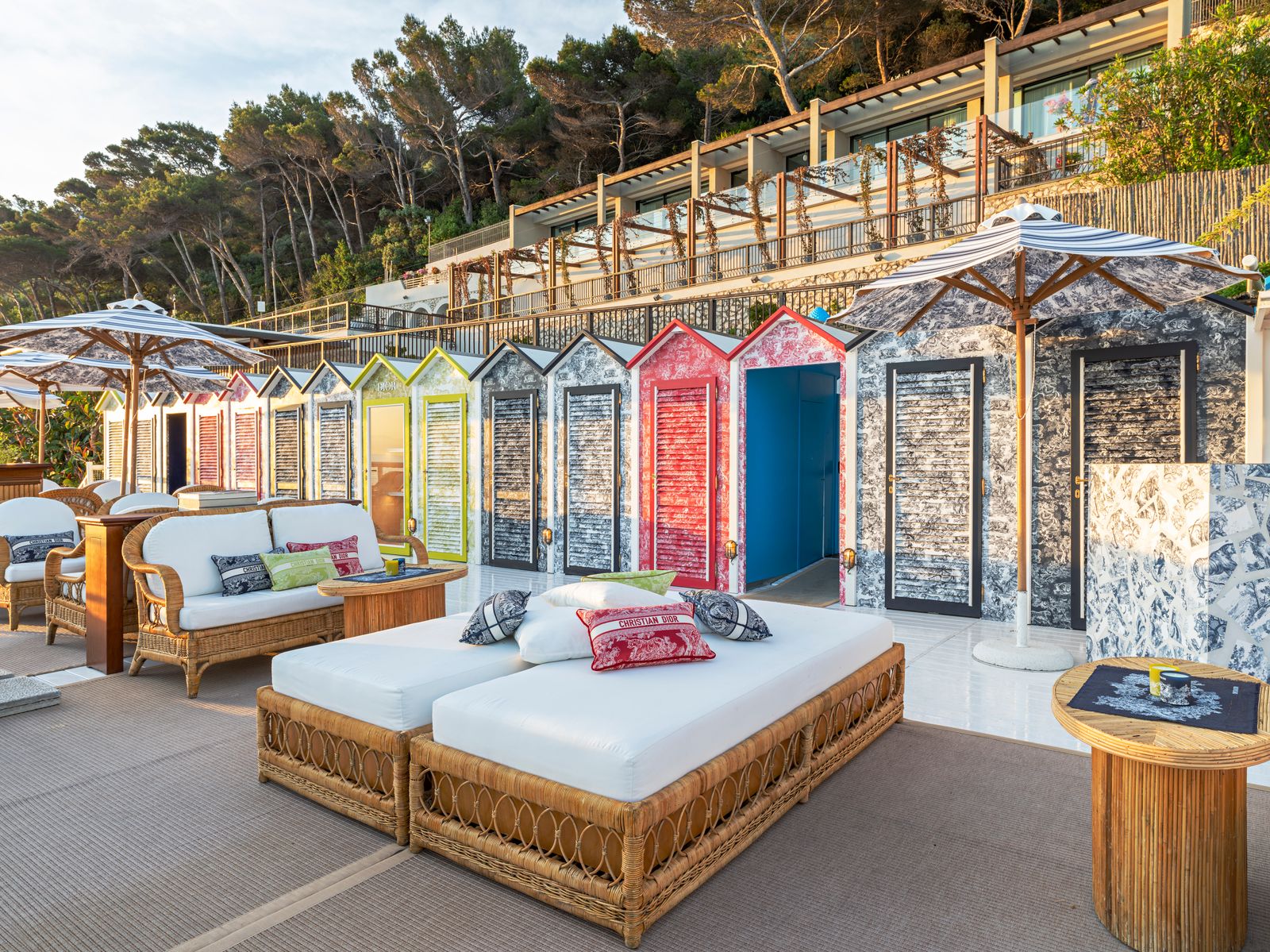 Outdoor event space at Il Riccio, Capri, with colorful beach huts for summer gatherings.