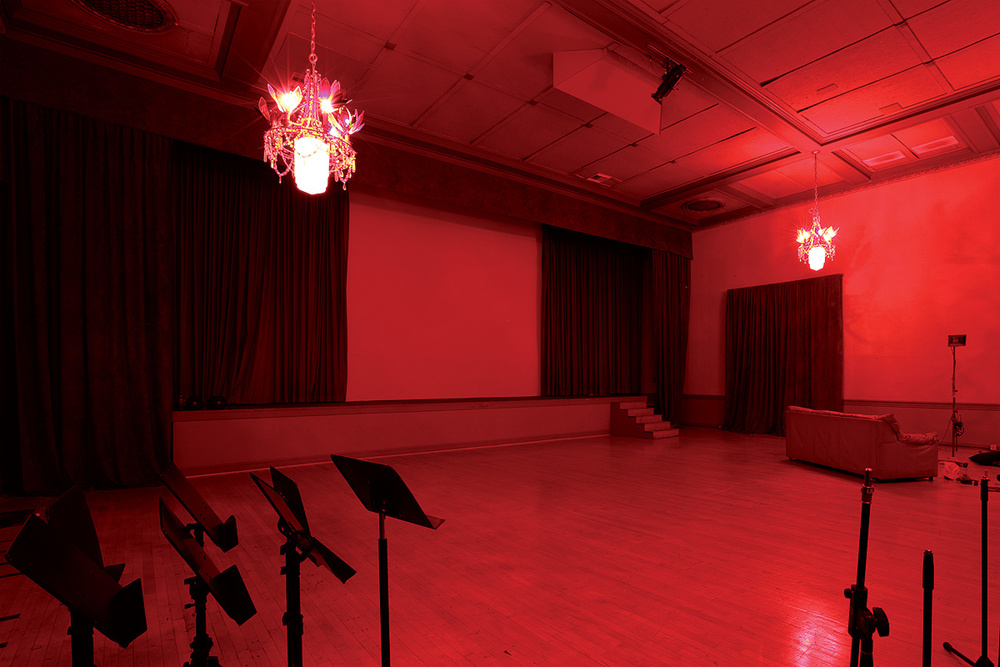 Red Gate Recorders Main Studio: elegant event space with red lighting, ideal for gatherings.