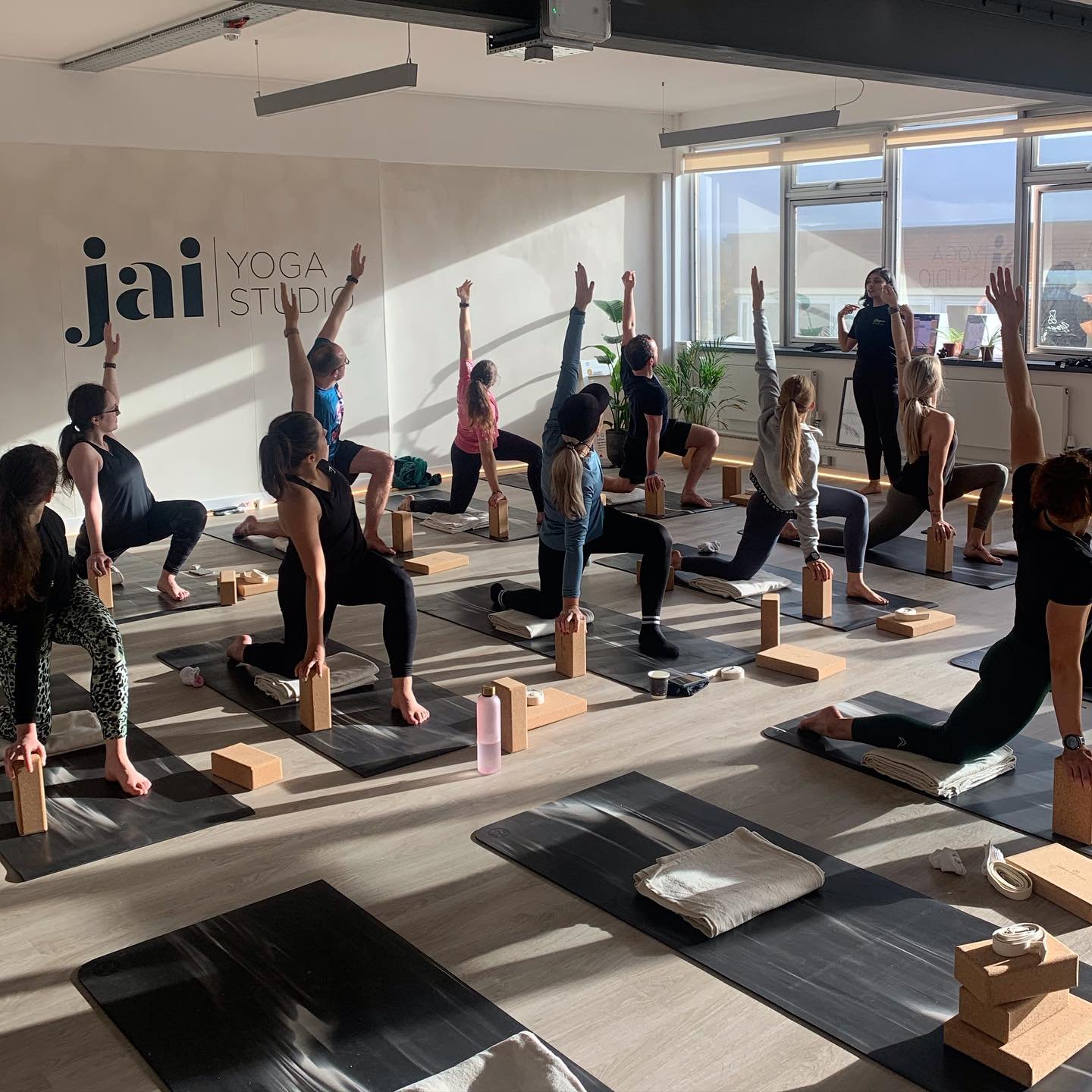 Vibrant yoga class at MH Yoga, promoting wellness and mindfulness in Hulme Center.