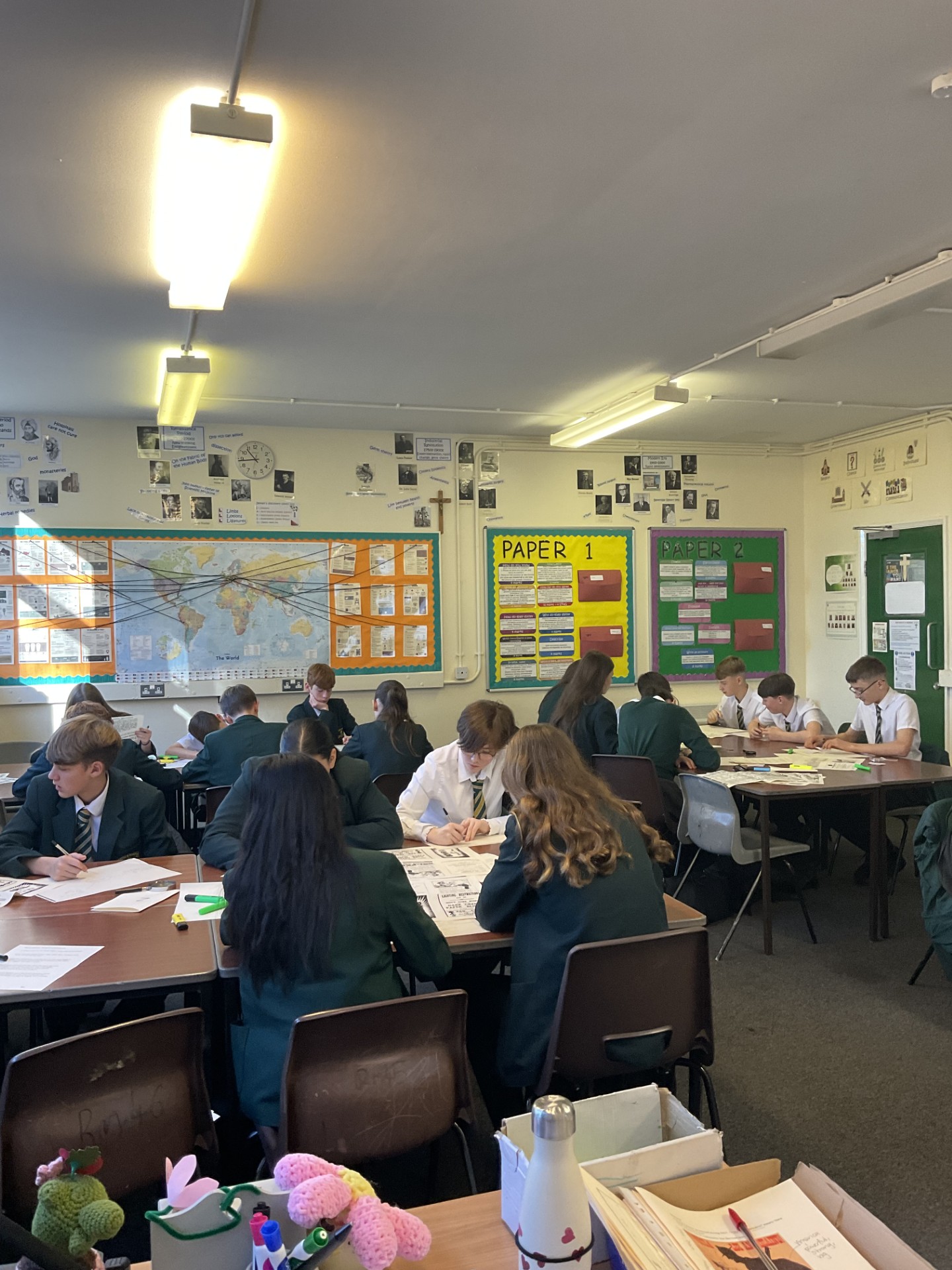 Students collaborating in Walter Tull Room for interactive learning and events.