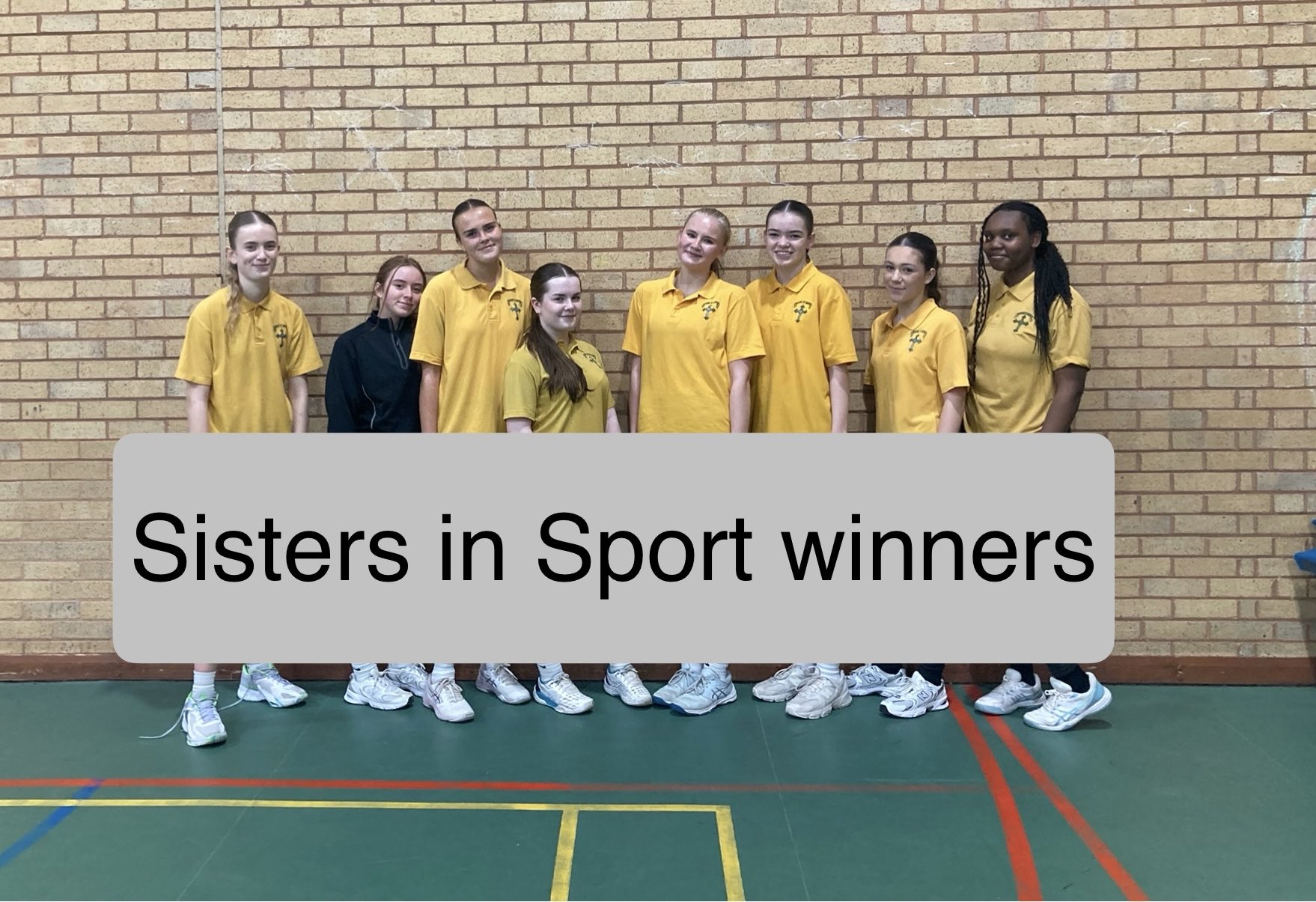 Young female athletes in yellow shirts celebrating Sisters in Sport victory at MAV UK.