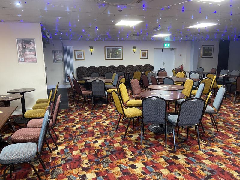 Hulme Community Hall event space with flexible seating for meetings and gatherings.