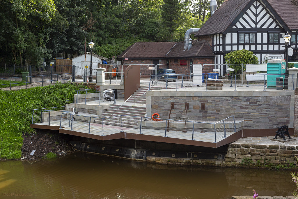 Waterfront restaurant terrace with scenic views for outdoor events and gatherings.