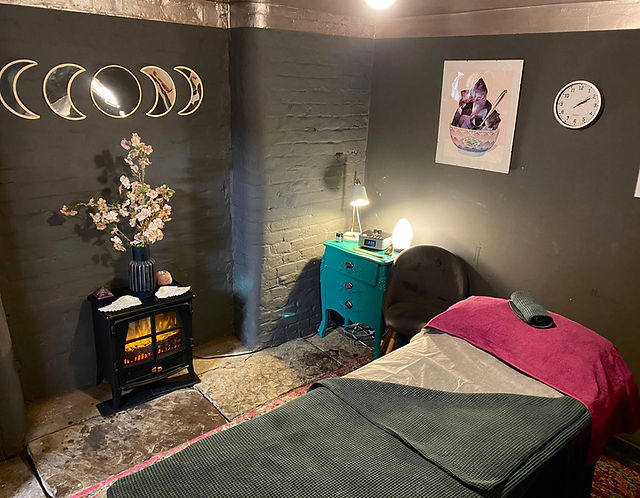 Tranquil therapy room with soft lighting for wellness retreats and relaxation events.