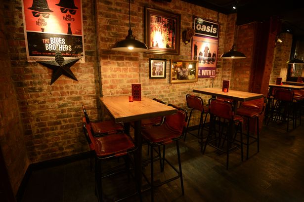 Stylish Buka Royale bar with rustic ambiance, perfect for networking and social events.