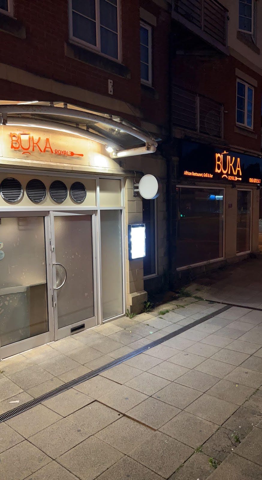 Modern dining lounge exterior at Buka Royale, perfect for events and gatherings.