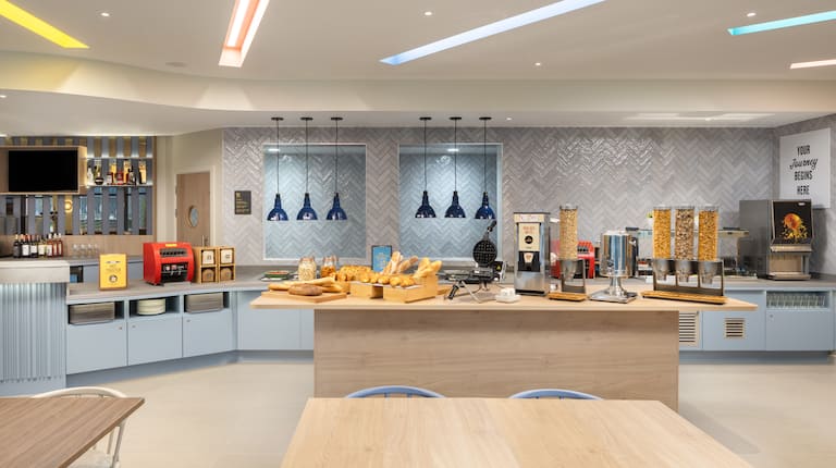 Modern meeting room with catering space at Hampton by Hilton Rochdale for events and networking.