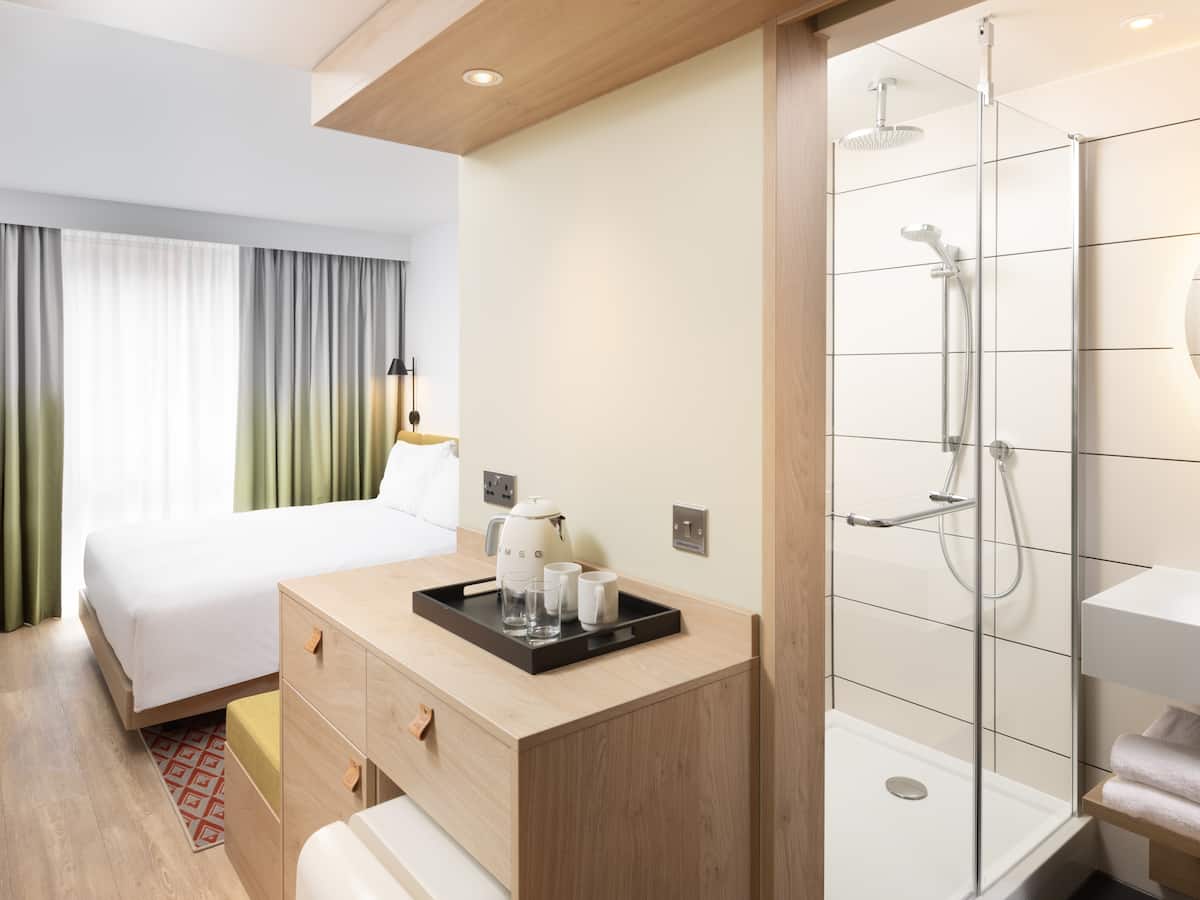 Meeting room at Hampton by Hilton Rochdale, featuring modern design for conferences.