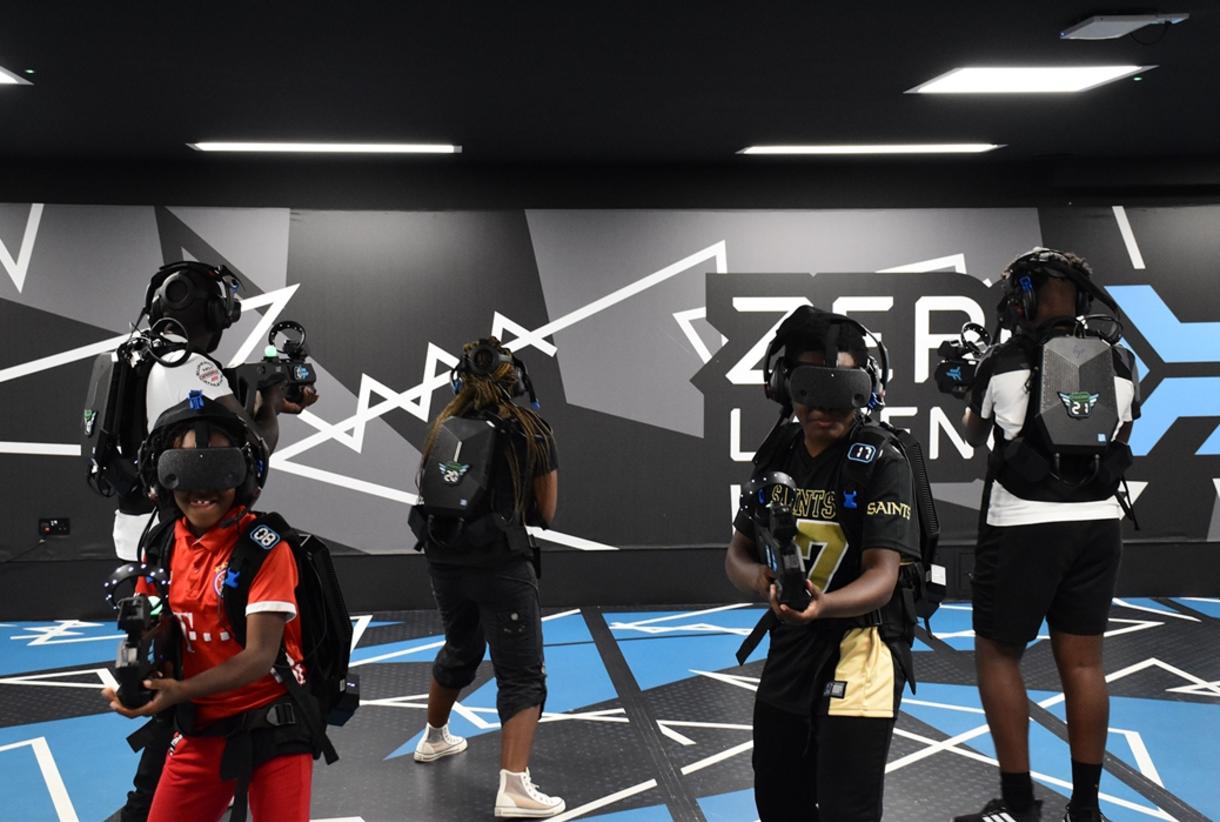 Group engaging in virtual reality at Immersive Play Zone, perfect for team-building events.