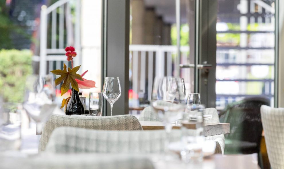 Elegant dining space at Hotel Okura Amsterdam for corporate events and social gatherings.