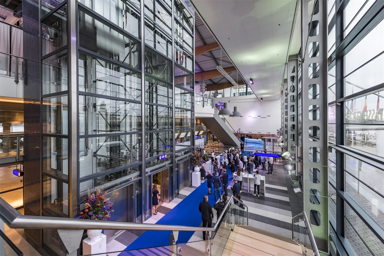 Promenade Deck in Passenger Terminal Amsterdam, modern event space with blue carpet.