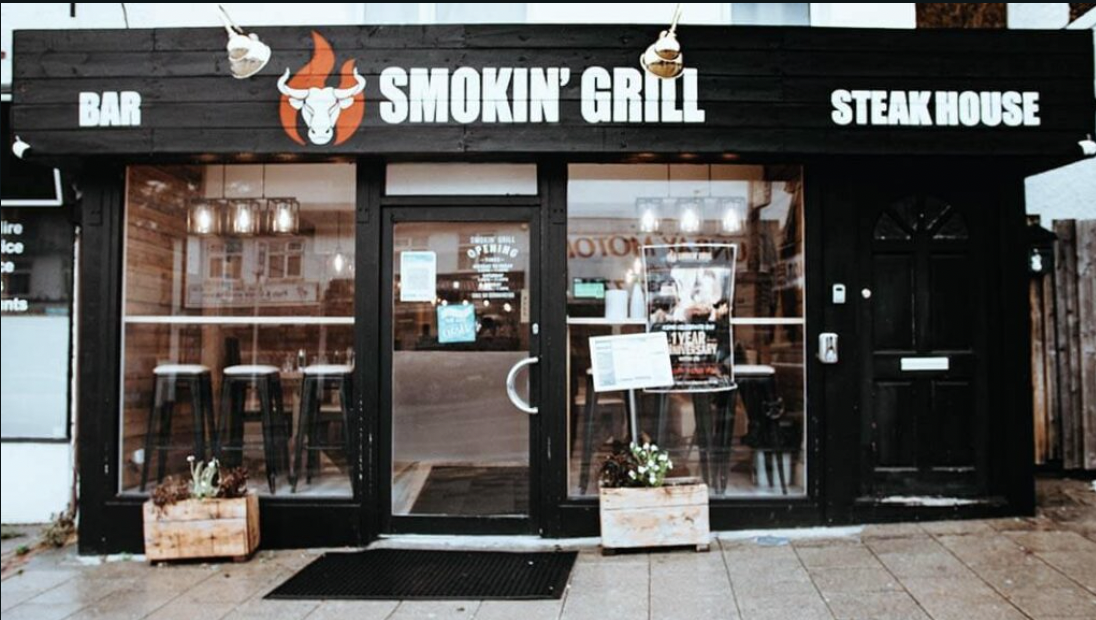 Welcoming entrance of Smokin' Grill Steakhouse for casual dining events and gatherings.