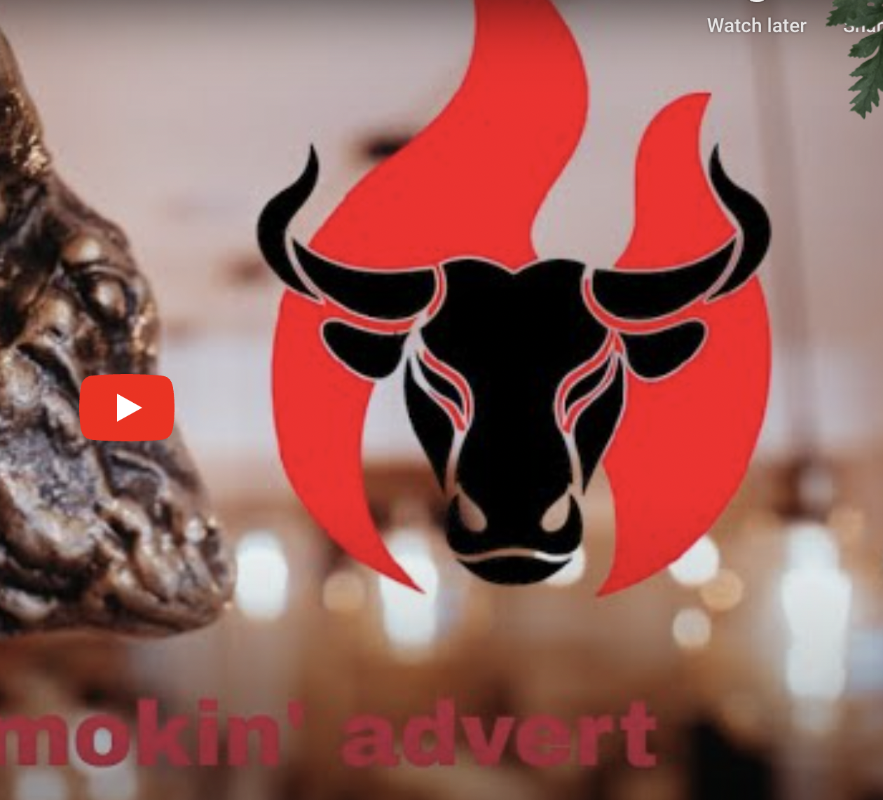 Bold bull logo signifying energy at Smokin' Grill Steakhouse for events and promotions.