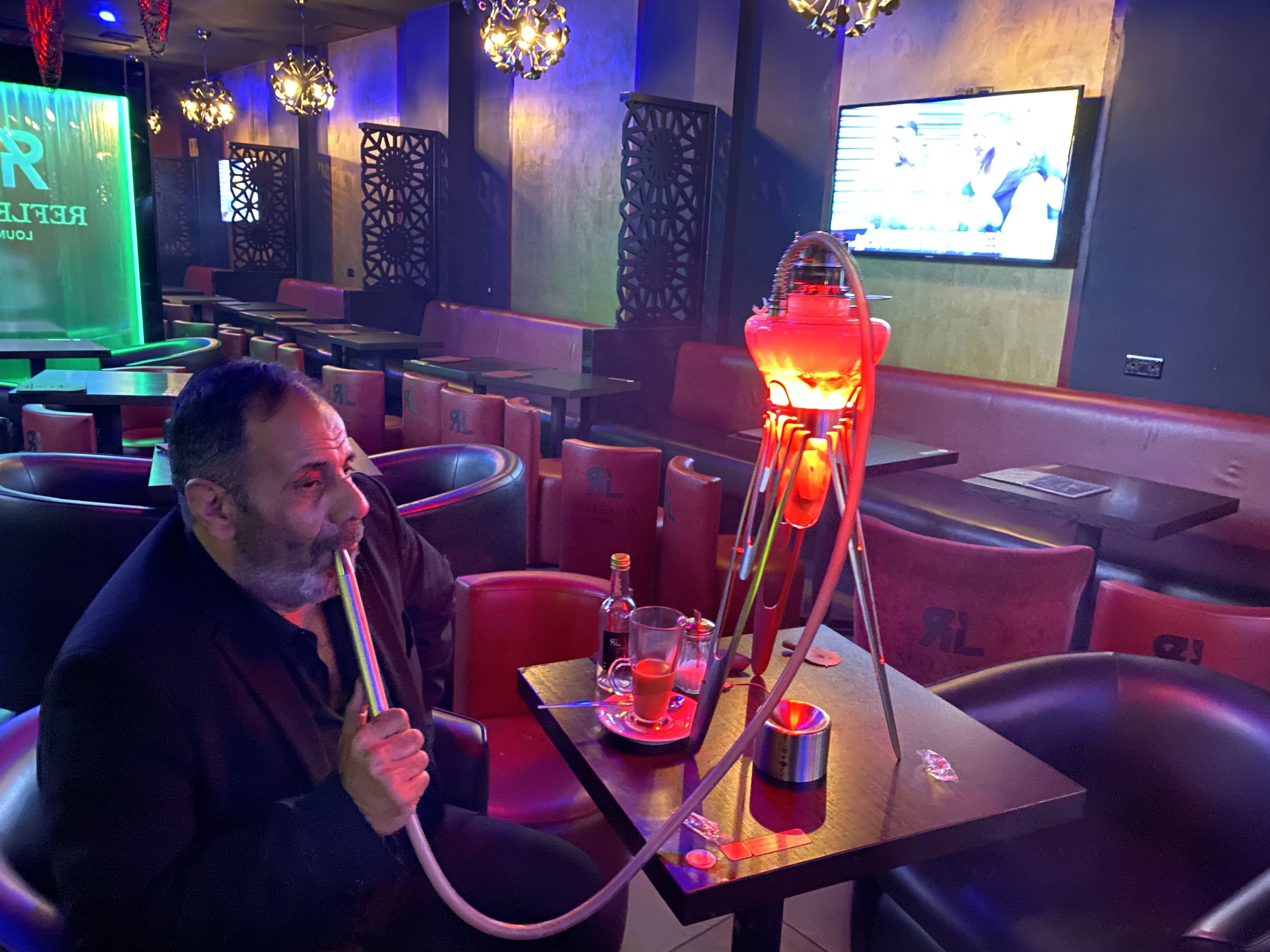 Hookah bar in Reflexion Lounge with cozy seating for casual networking events.