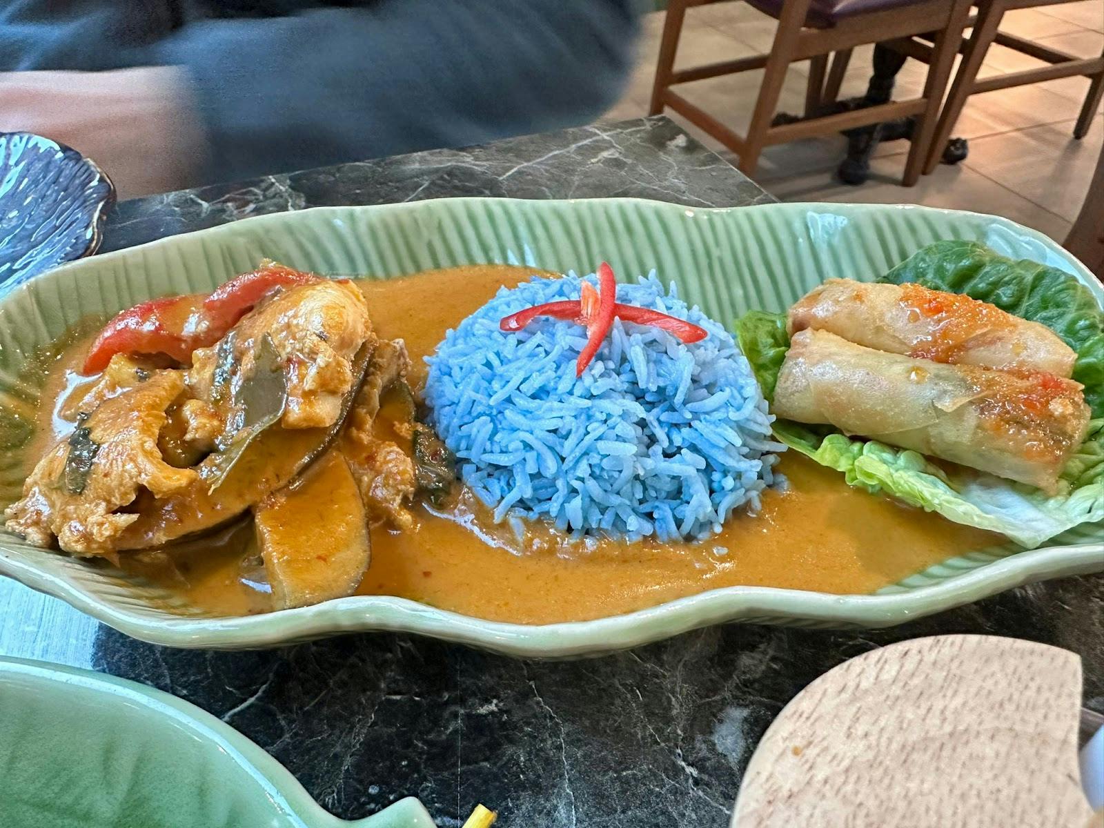 Vibrant blue rice dish at Mai Thai Deli for culinary events and multicultural menus.