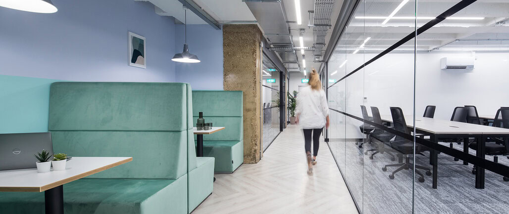 Modern office space with glass-walled conference rooms at Work.Life Farringdon for meetings.