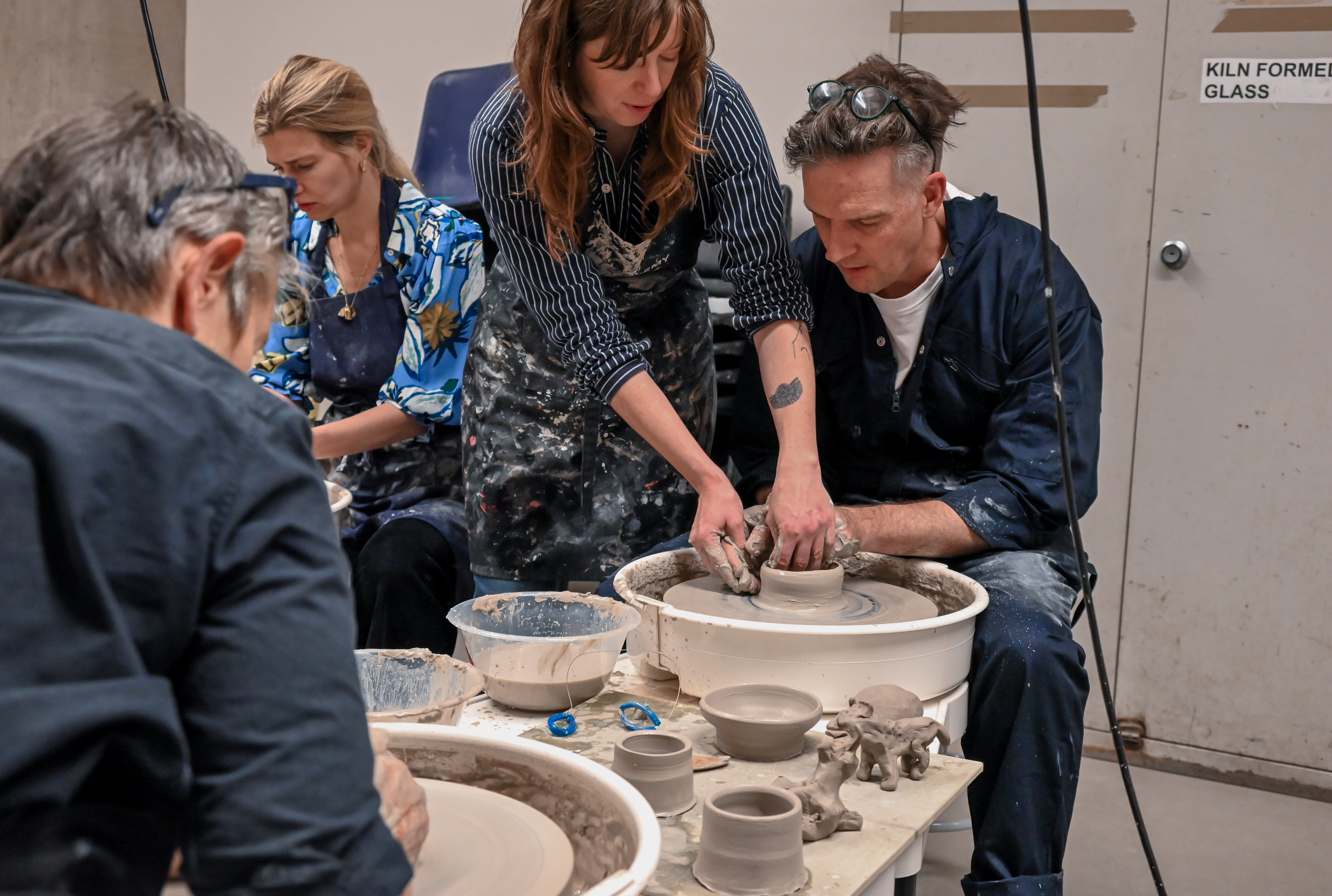 Alt text: Ceramics studio workshop for team-building and creative retreats with pottery making.