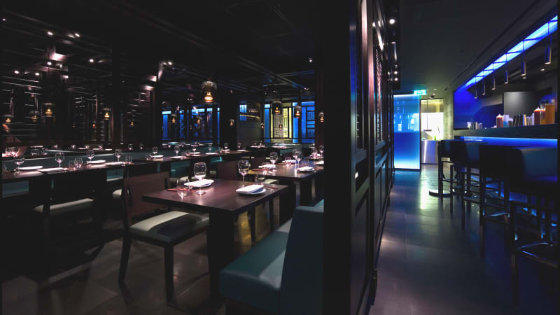 Stylish Hakkasan lounge with atmospheric lighting for upscale events and receptions.