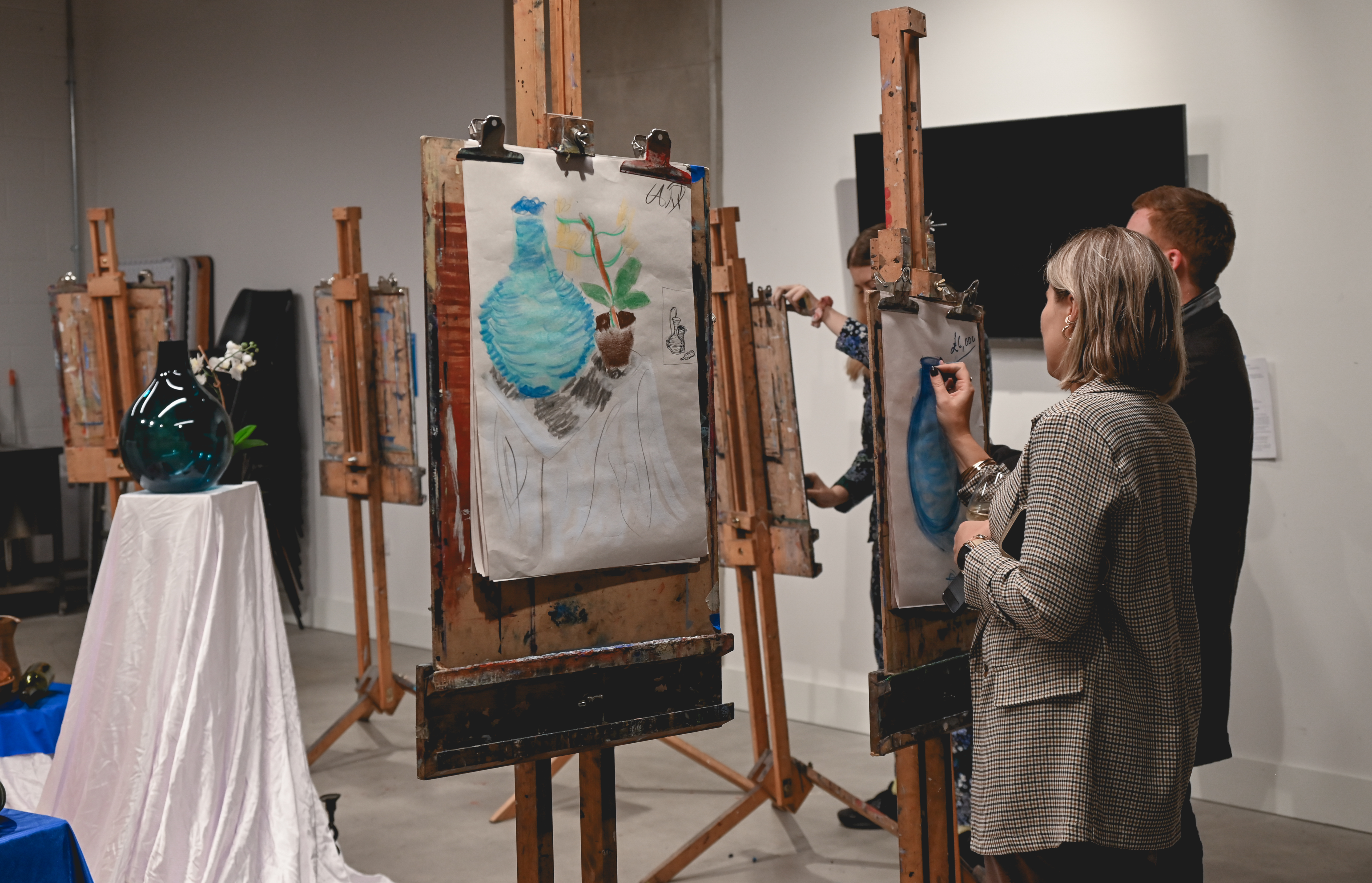 Creative painting workshop with easels at The Art Academy, ideal for team-building events.