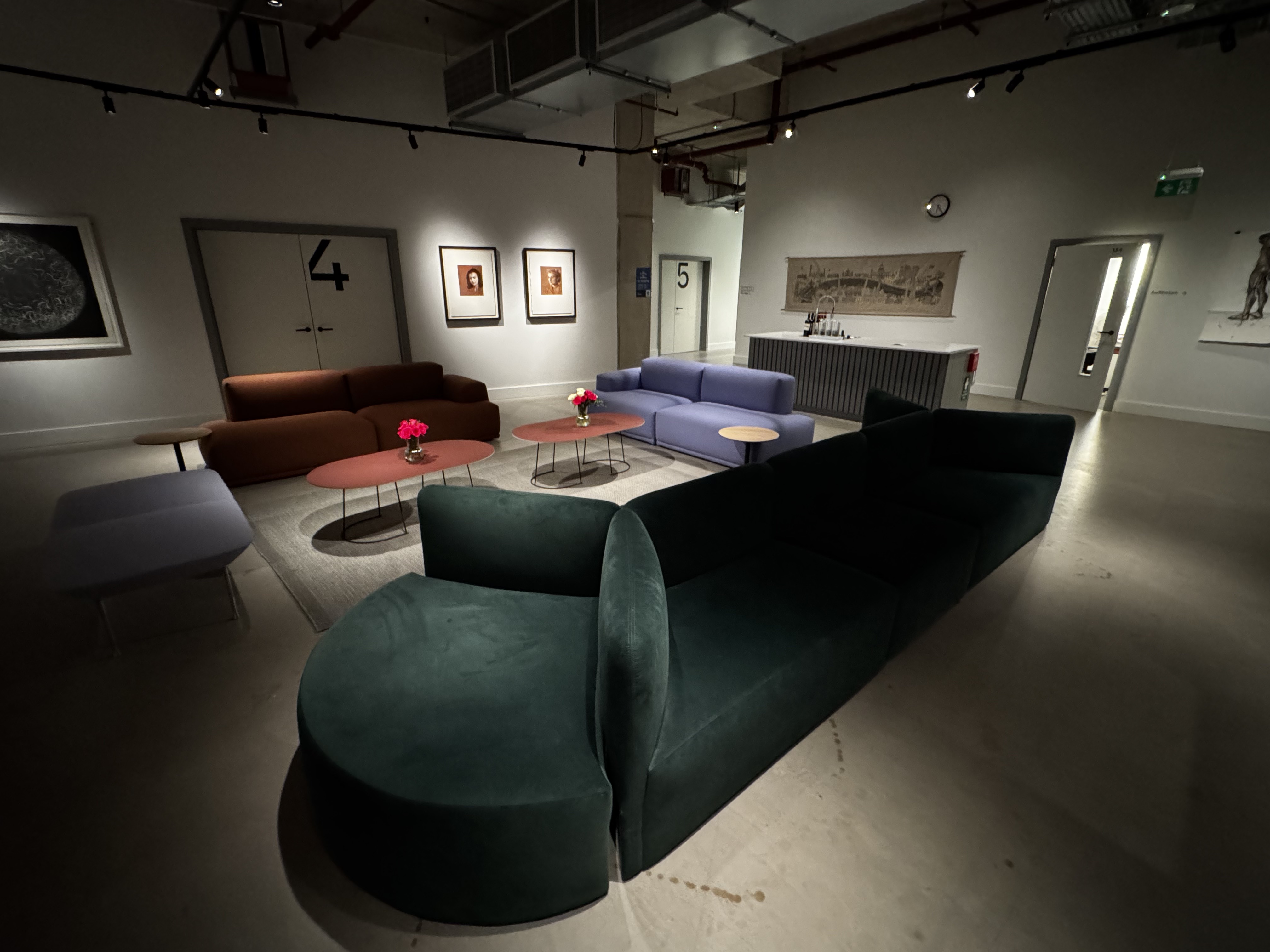 Modern lounge area in The Hub, perfect for networking events and casual meetings.