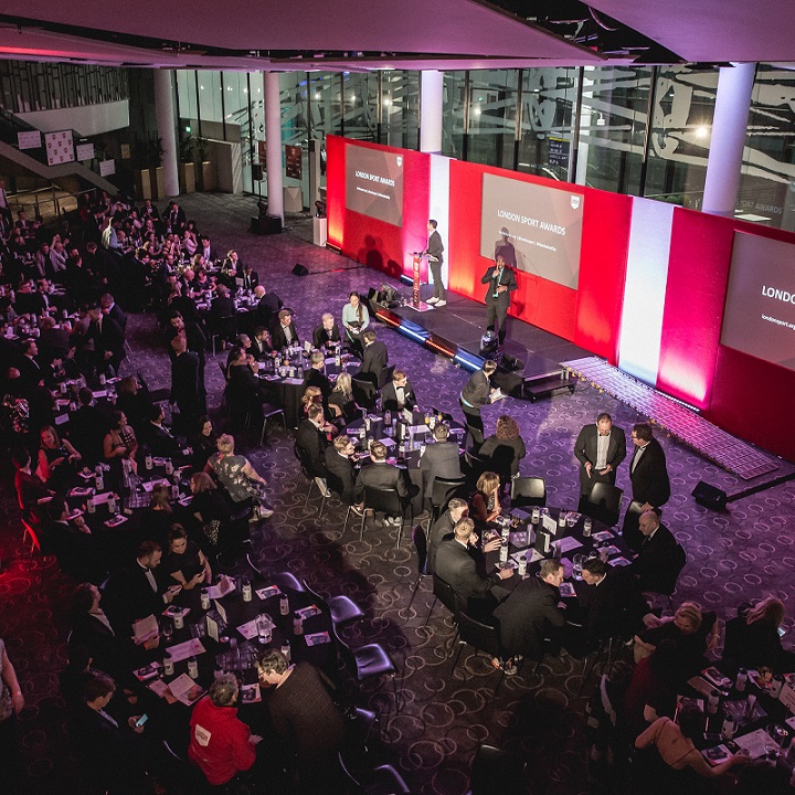 Bobby Moore Room at Wembley Stadium, elegant corporate event with interactive presentations.