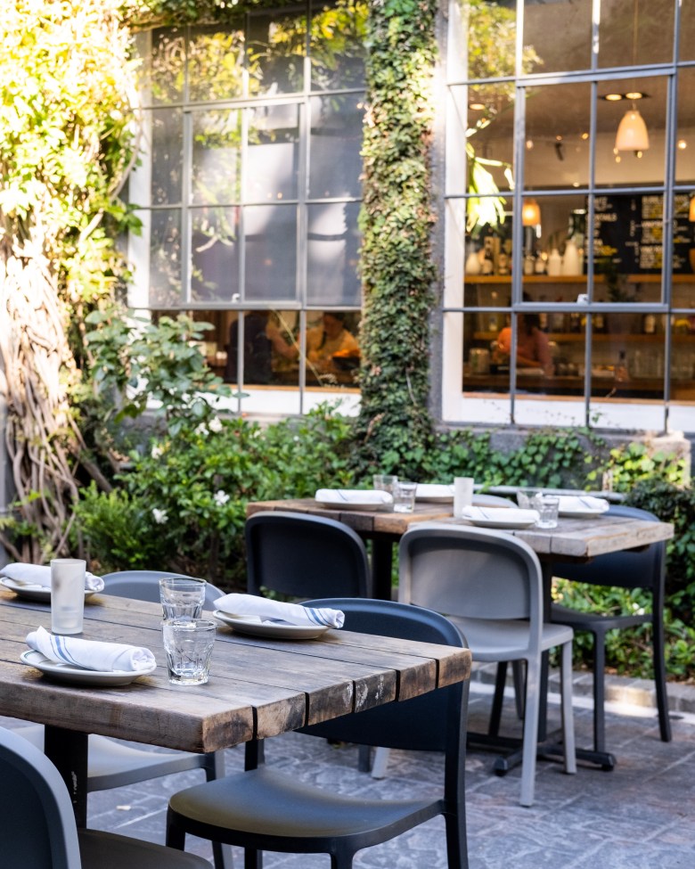 Charming outdoor dining at Pizzeria Delfina, perfect for networking lunches and events.