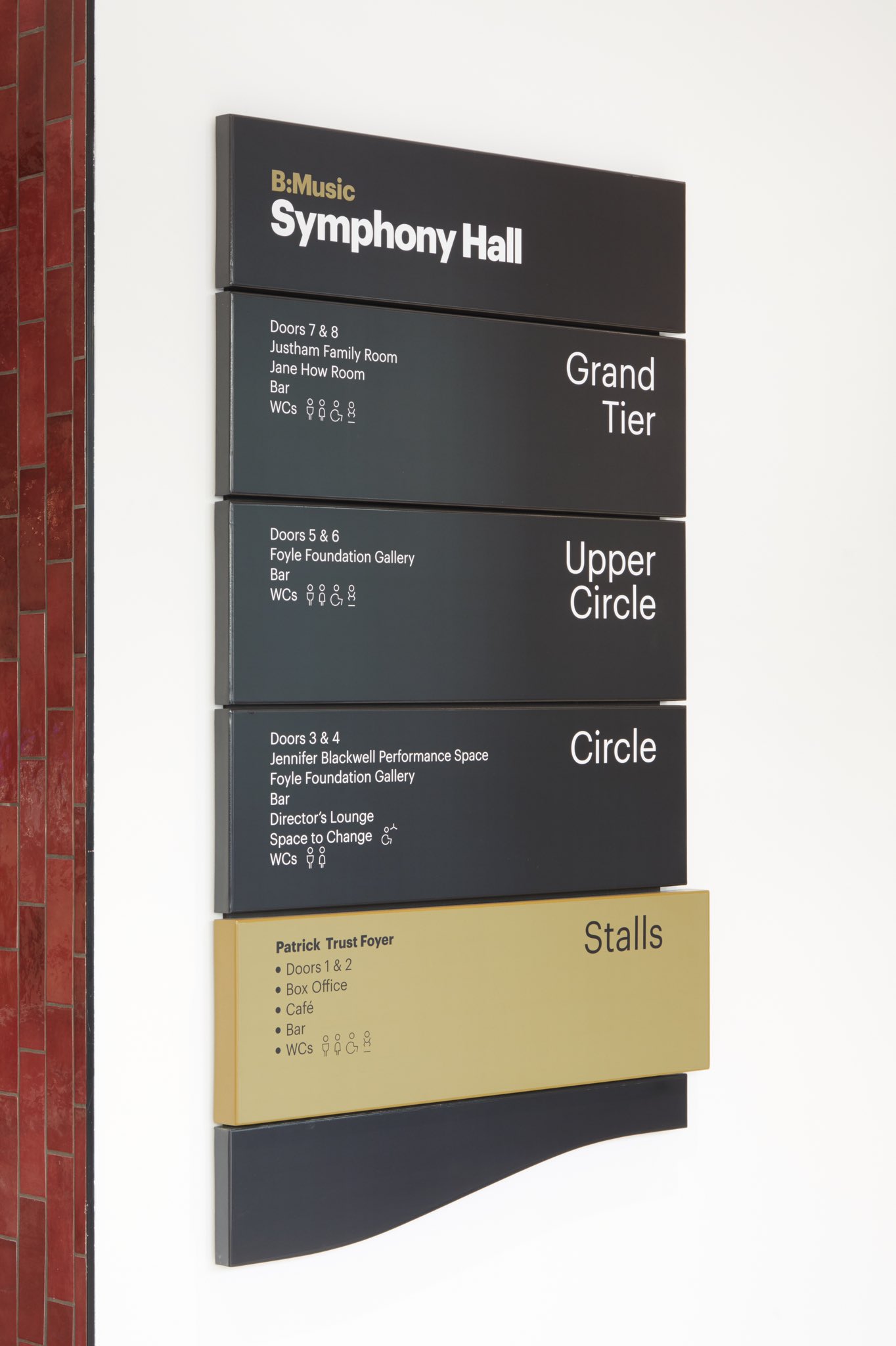 Directional signage board in Justham Family Room for smooth event navigation.