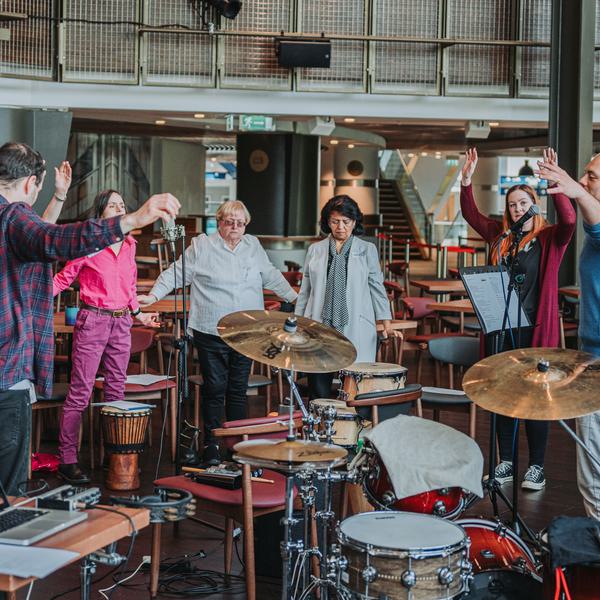 Justham Family Room at B:Music, featuring an interactive team-building meeting setup.