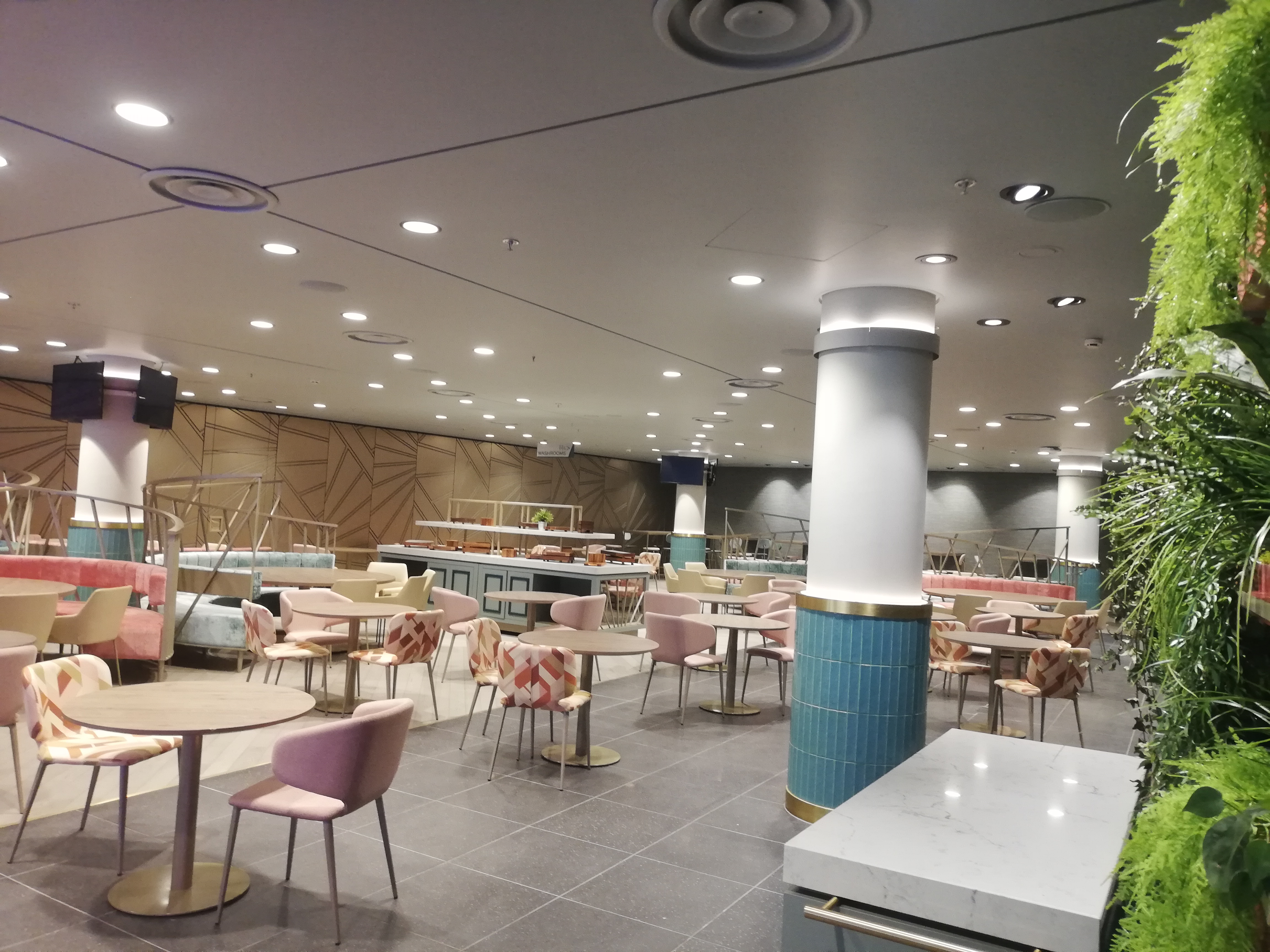 Wembley Stadium Atrium: modern event venue with versatile seating for conferences and gatherings.