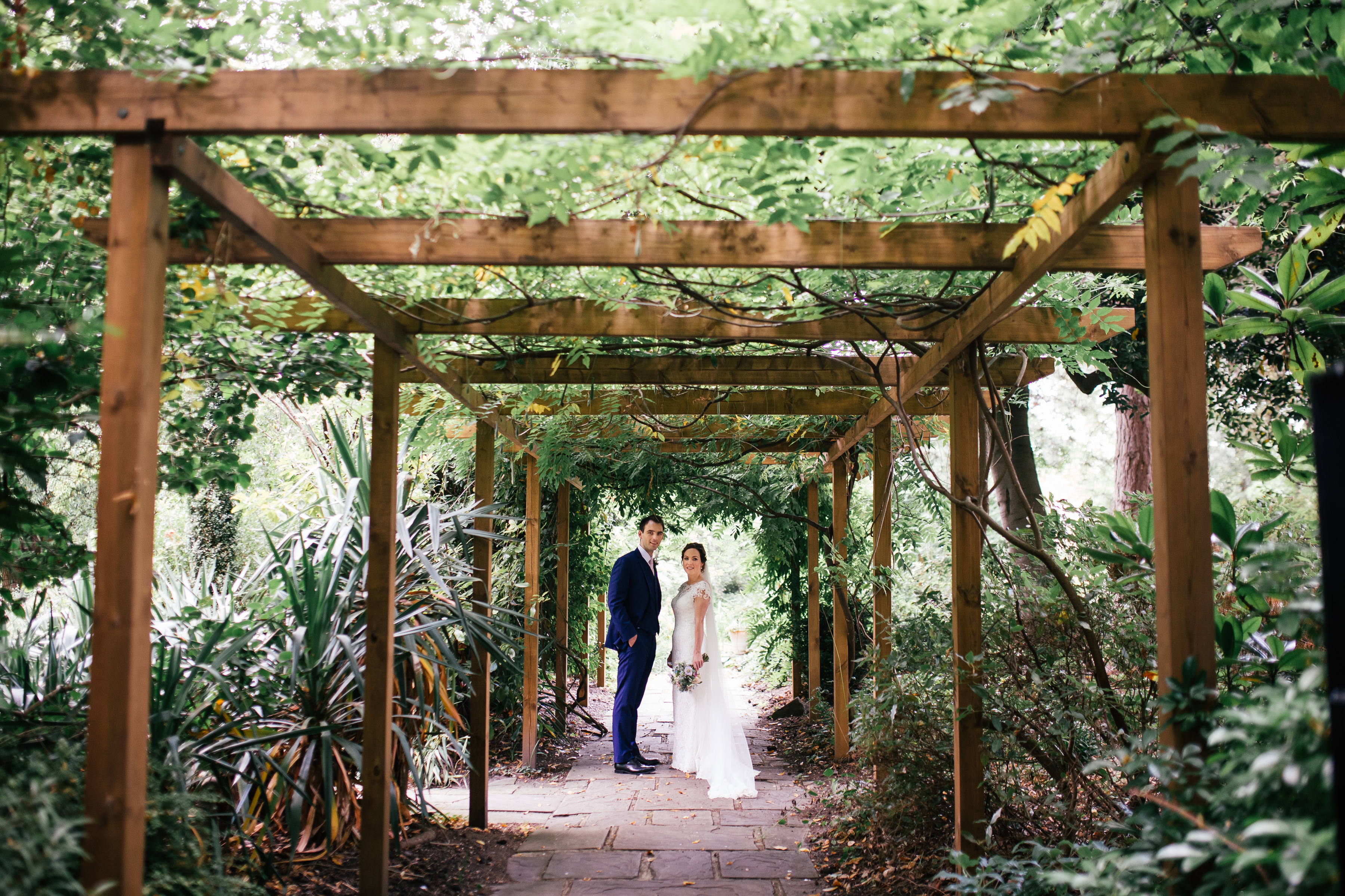 York Lawns outdoor wedding venue with greenery and wooden structure for intimate ceremonies.