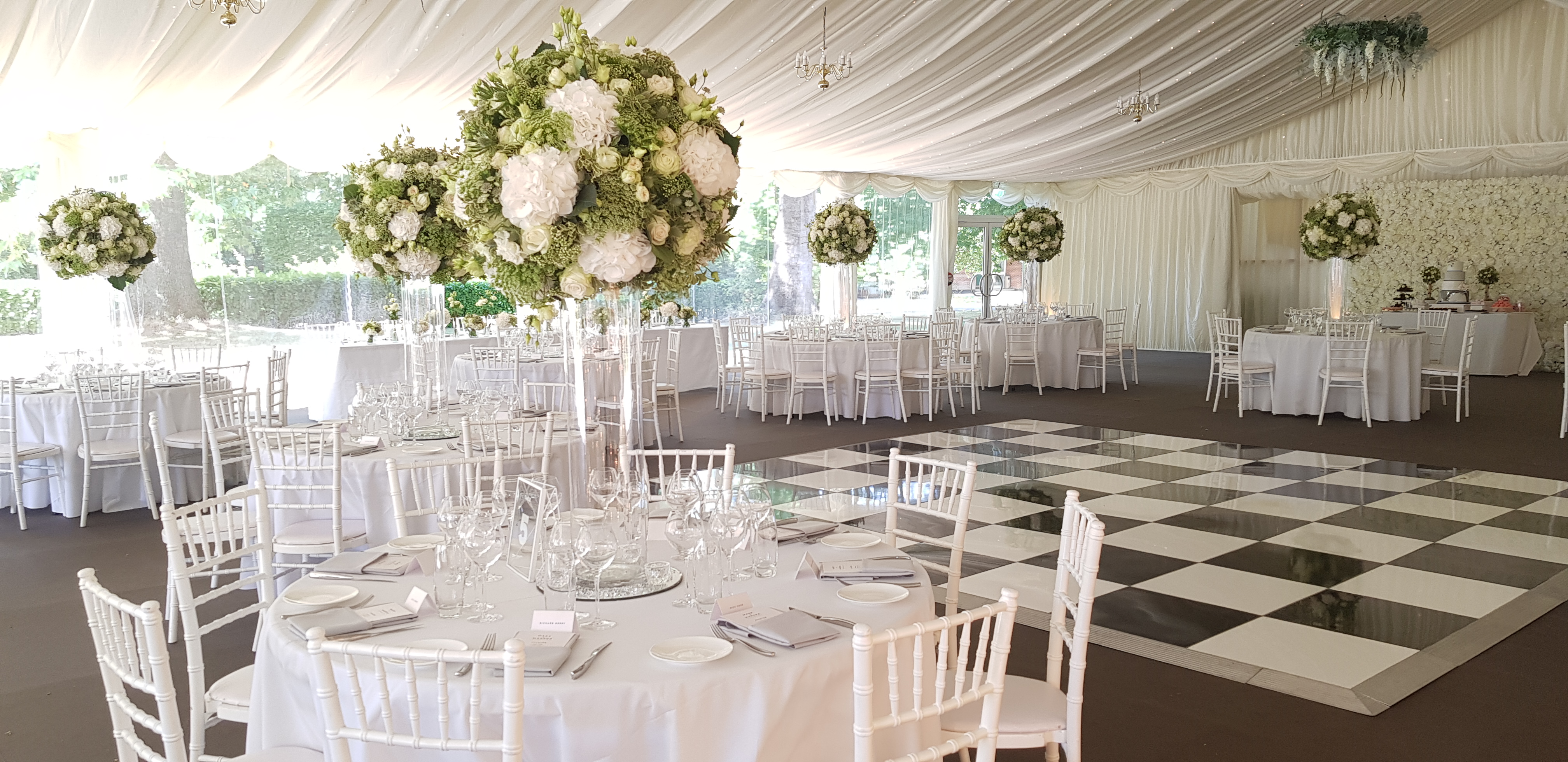 Elegant York Lawns event space with floral centerpieces, perfect for weddings and upscale events.