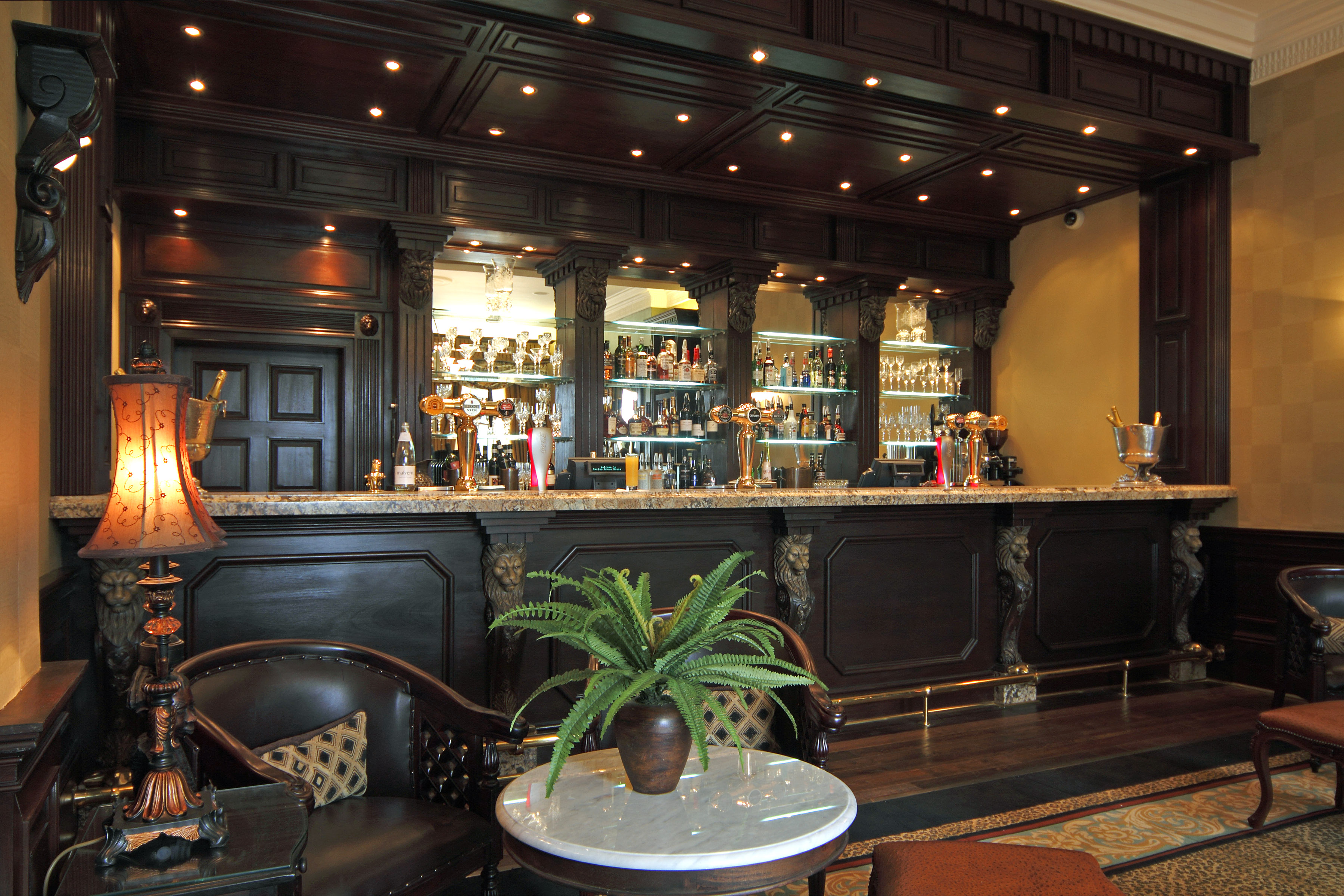 Spring Grove House bar area with elegant wood design, ideal for networking events.