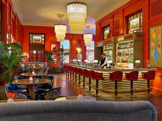 Cocktail bar at The Coral Room with stylish decor, ideal for networking events and gatherings.