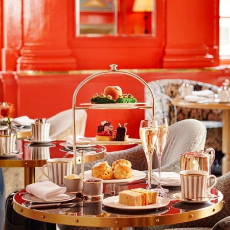 "Elegant afternoon tea setup with pastries at Small Plates restaurant, The Coral Room."