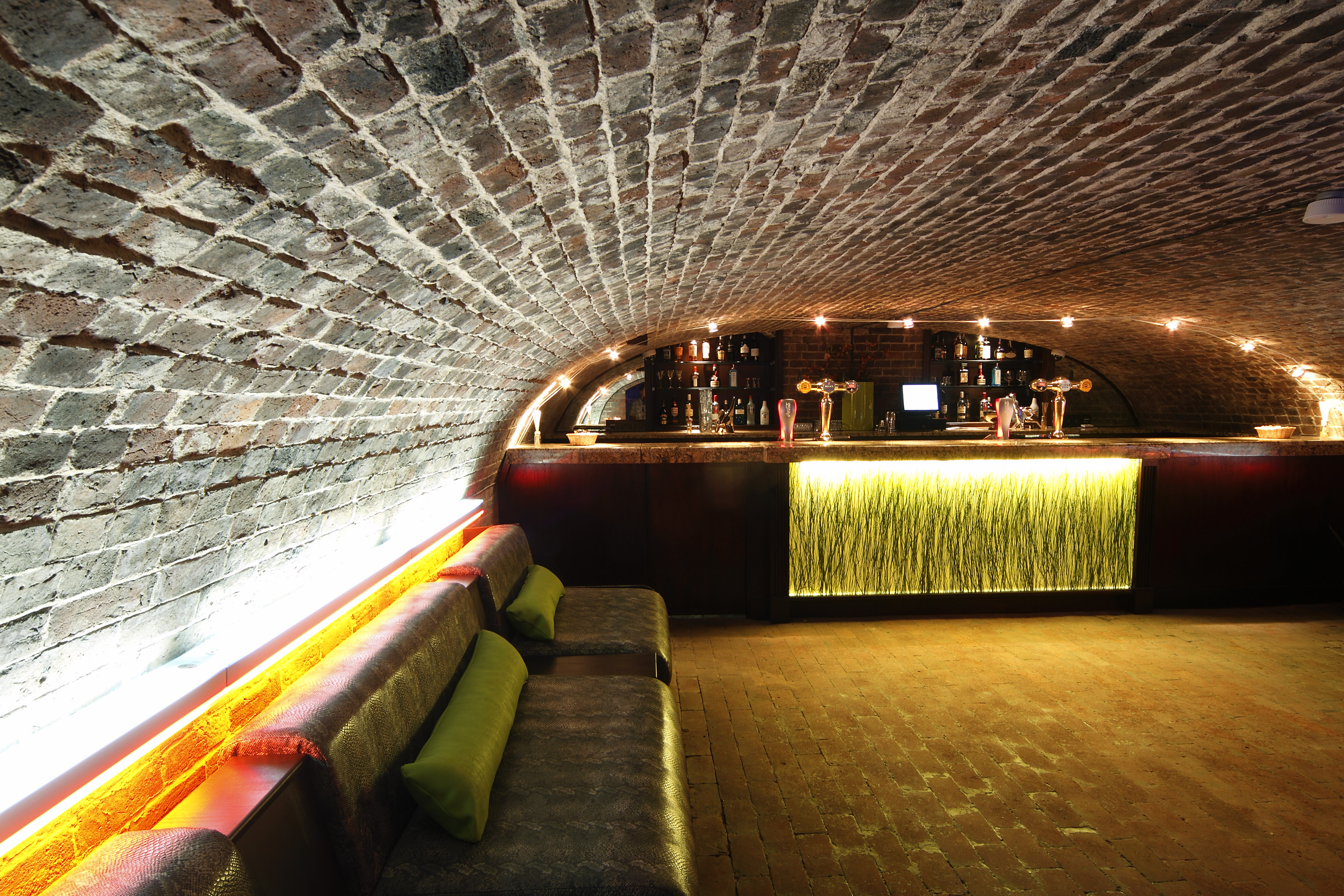 Stylish underground venue with arched brick ceiling for networking events in West Midlands.