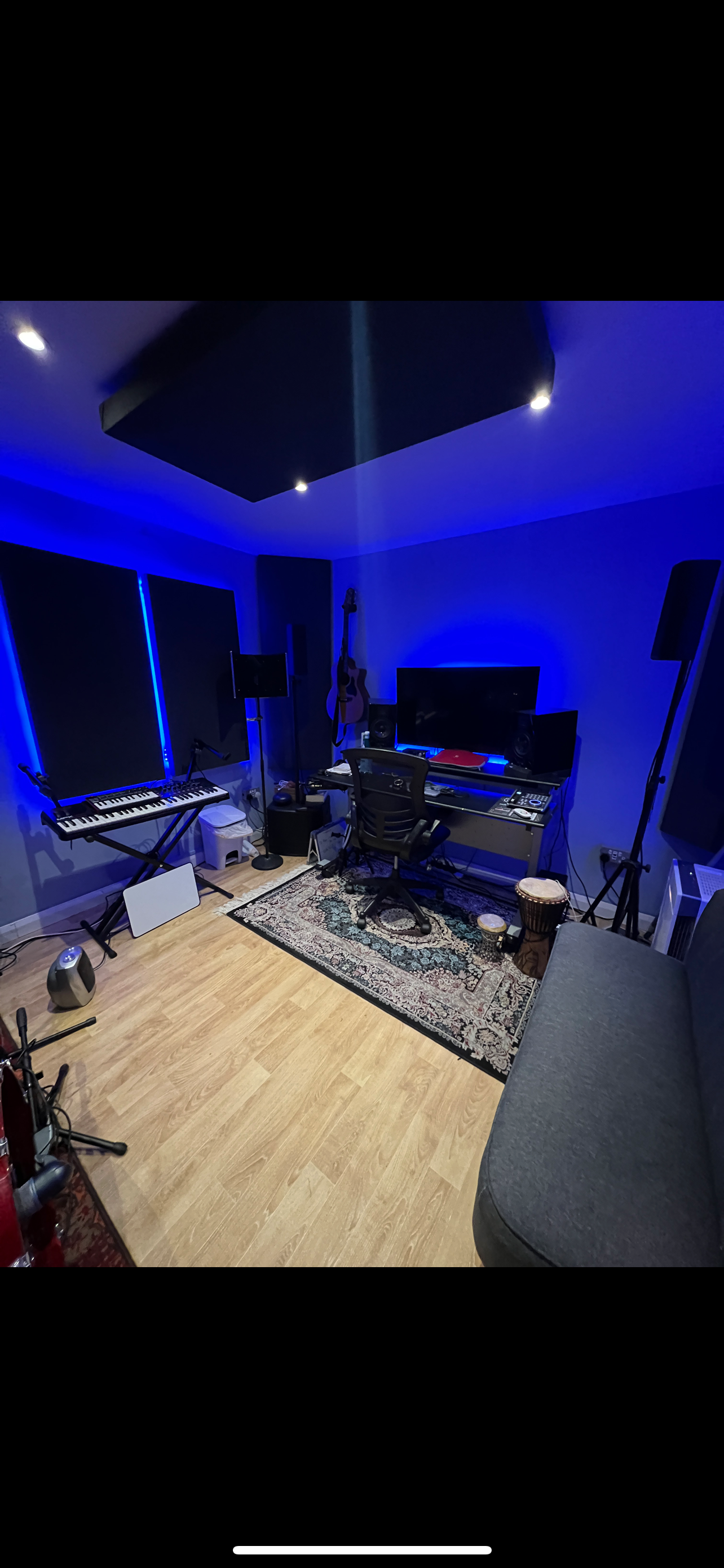 Modern music studio with acoustic panels for creativity and innovation events.