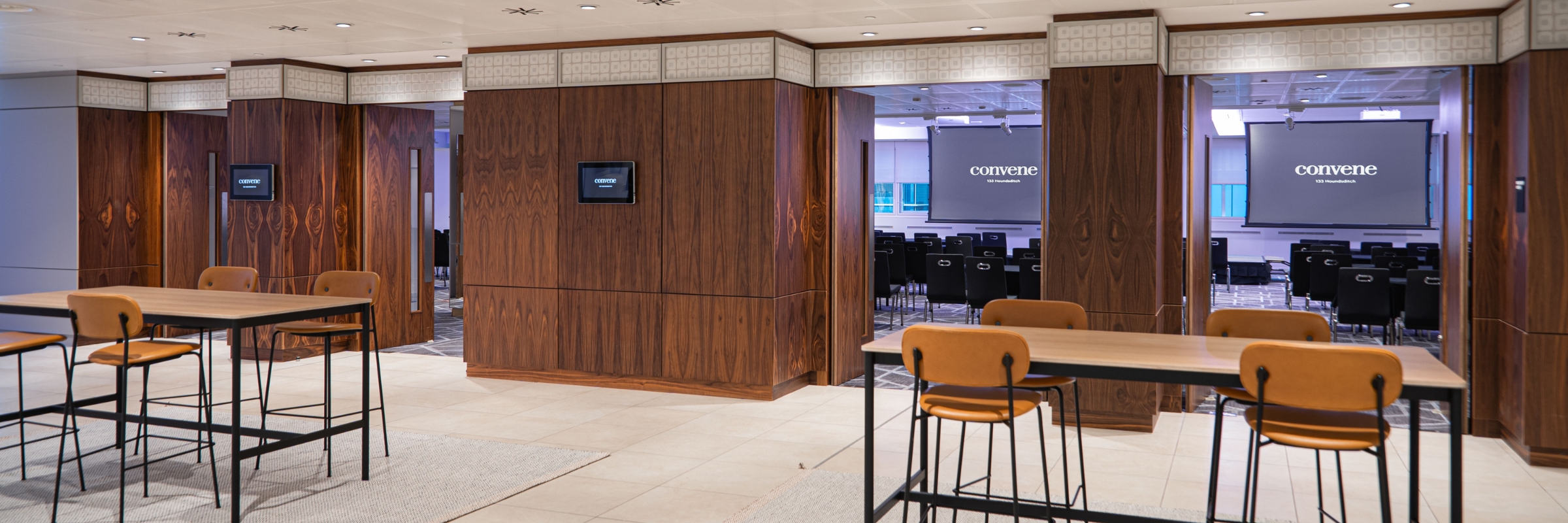Modern conference space with wooden accents at Convene 133 Houndsditch for meetings and workshops.